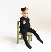 Ribbed Ruffle Zipper Footie in Midnight