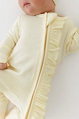 Ribbed Ruffle Zipper Footie in Chamomile