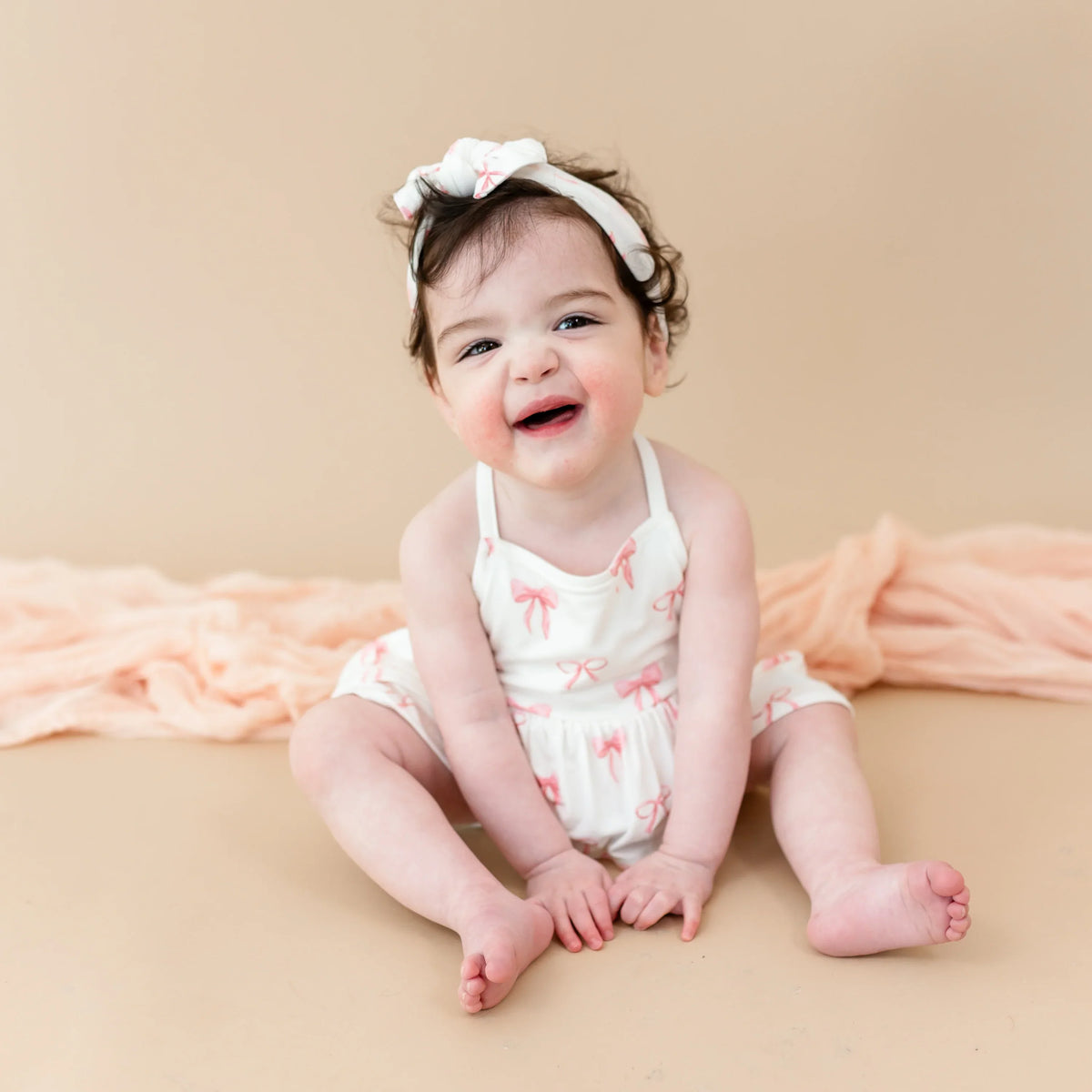 Spaghetti Strap Ruffle Romper in Bow