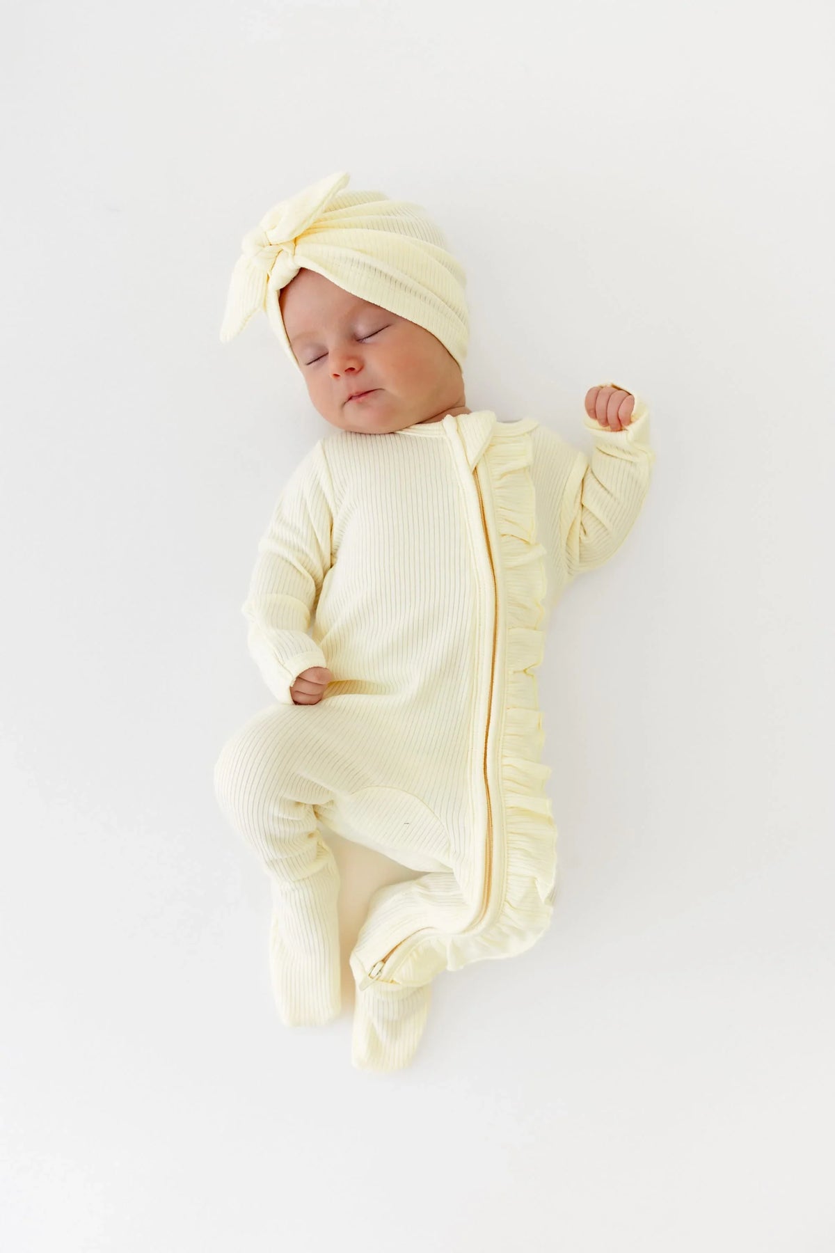 Ribbed Ruffle Zipper Footie in Chamomile